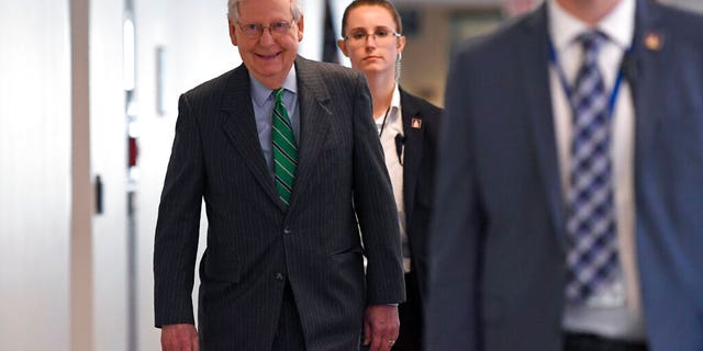 Senate Majority Leader Mitch McConnell of Ky., walk to attend a Republican policy lunch on Capitol Hill in Washington, Thursday, March 19, 2020. (AP Photo/Susan Walsh)