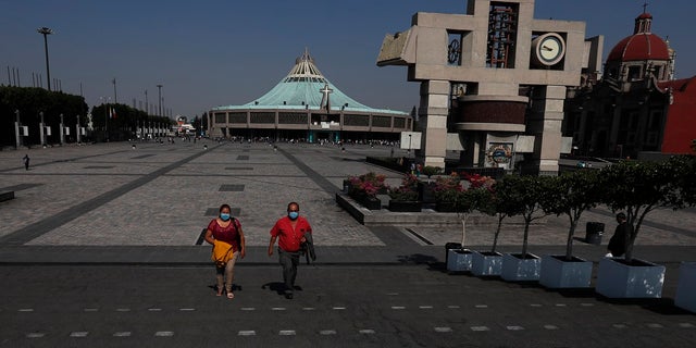 Pilgrims leave the Basilica of Guadalupe in Mexico City,on Sunday. Many countries in Latin America have taken aggressive measures to deal with the new coronavirus such as closing their borders, dock and airports to foreigners. Mexico, by contrast, has so far taken a "business as usual" attitude. The vast majority of people recover from the COVID-19 disease. (AP Photo/Marco Ugarte)