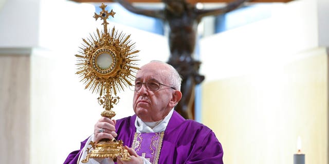 Pope Francis celebrates Mass at his Santa Marta residence, at the Vatican, Thursday, March 26, 2020. 