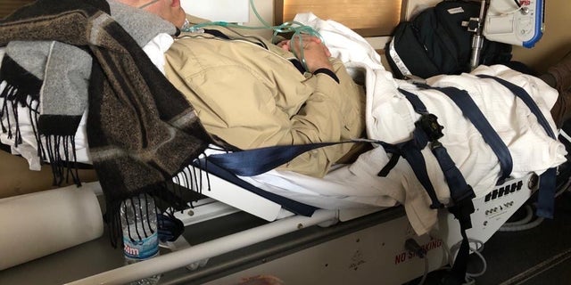 Amer Fakhoury resting on stretcher on his way home to the U.S. Courtesy of the Fakhoury family.