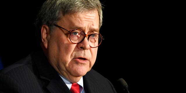 FILE - In this Feb. 10, 2020, file photo, Attorney General William Barr speaks at the National Sheriffs' Association Winter Legislative and Technology Conference in Washington. (AP Photo/Susan Walsh, File)