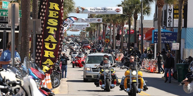 Bikers fill Main Street during Bike Week in Daytona Beach on Saturday, March 7, 2020. (Stephen M. Dowell/Orlando Sentinel via AP)