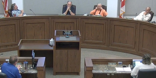 Okeechobee County Commission meeting Friday. Bryant Culpepper is third from left.