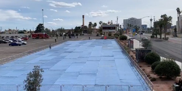 Padding carpeting was initially included on the parking lot site, but then Las Vegas officials said it couldn't be "adequately sanitized."