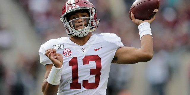 Alabama quarterback Tua Tagovailoa (13) was drafted with the No. 6 pick by the Miami Dolphins. (AP Photo/Sam Craft)