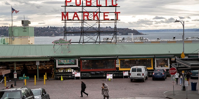 SEATTLE, WASHINGTON - MARCH 10: The Pike Place Market stands virtually empty of patrons on March 10, 2020 in downtown Seattle, Washington. The historic farmer's market is Seattle's most popular tourist attraction, and business has been especially hard hit by coronavirus fears. (Photo by John Moore/Getty Images)