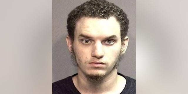 Robert Hester Jr., 28, following his arrest in Columbia, Mo. in an unrelated case. He was sentenced Wednesday to 19 years in prison for attempting to provide material support to the Islamic State. (Boone County Sheriff's Department)