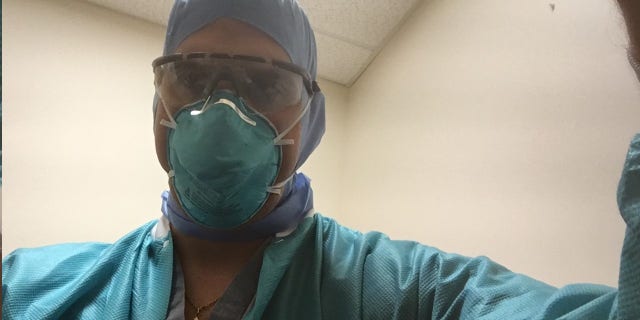 Dr. Christian DiPaola always wears full protective gear in his Massachusetts hospital, going much further than CDC guidelines.