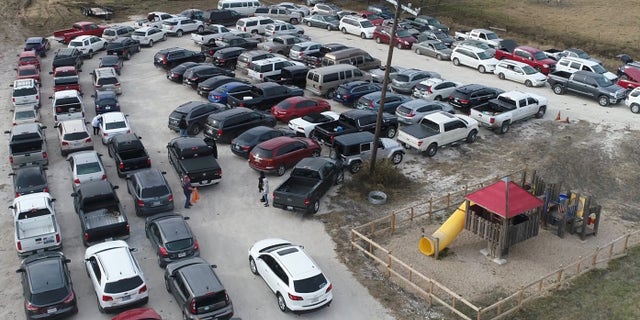 OpenDoor Church in Burleson, , hosts drive-thru prayer at their church amid the coronavirus outbreak.