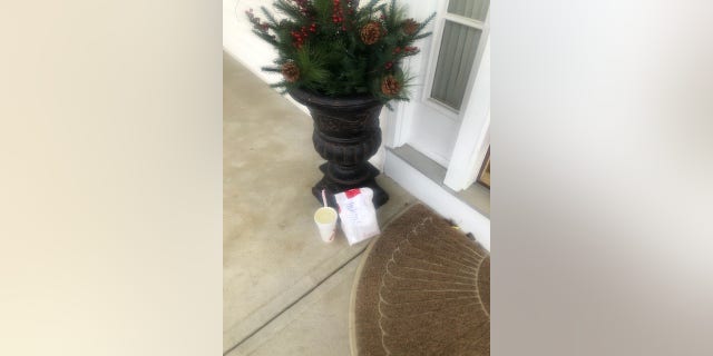 "Lisa" leaves a delivery on the doorstep as a precaution due to the coronavirus outbreak.