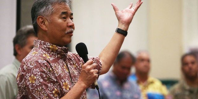 This week, Hawaii Governor David Ige (seen here at an earlier event) urged visitors to postpone their trips to Hawaii for at least 30 days.