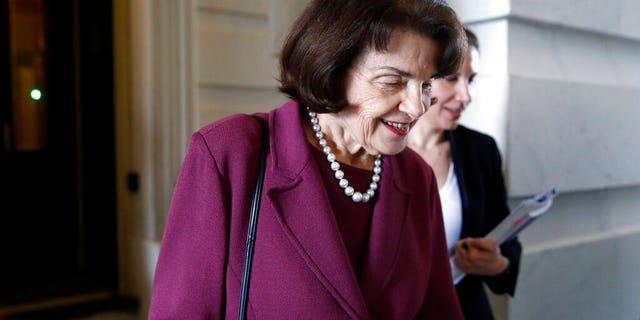 Sen. Dianne Feinstein, D-Calif., departs on Capitol Hill in Washington, after a vote on a coronavirus response bill. (AP Photo/Patrick Semansky)