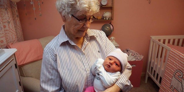Geneva Wood and one of her great-grandchildren June Neidigh.