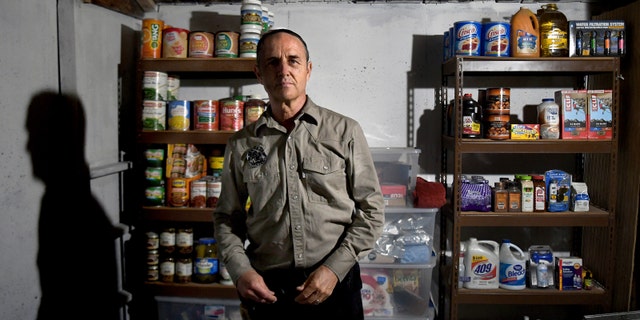 LOST CITY, WV-AUGUST 23: Drew Miller inside a well-stocked fortified bunker that's still under construction on August 23, 2019. Miller, a retired Air Force intelligence officer and Harvard-educated writer, has been establishing compounds for the apocalypse. So far about 100 people have joined. (Photo by Michael S. Williamson/The Washington Post)