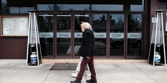 Empty streets, restaurants and cafes make up the business area in the one mile containment zone on March 11 in New Rochelle, N.Y.