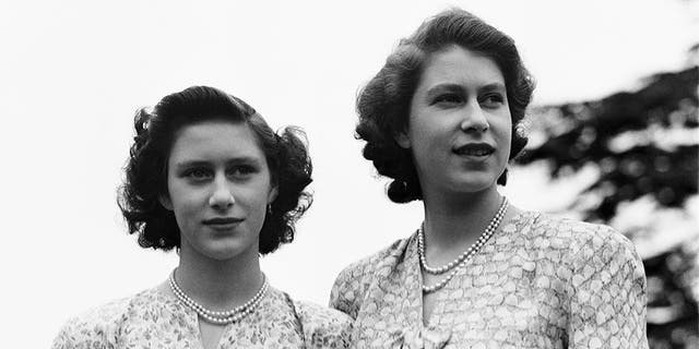 Princess Elizabeth and her sister Princess Margaret (1930 - 2002) at the Royal Lodge, Windsor, UK, 8th July 1946.