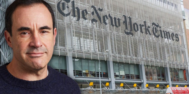 "New York city, USA - April 22, 2012: Three yellow cabs pass in front of the New York Times headquarters in New York as thestreet light turns to green."