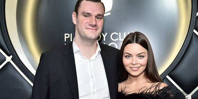 Cooper Hefner and Scarlett Byrne arrive at Playboy Club New York Grand Opening on September 12, 2018 in New York City.