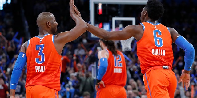 Oklahoma City Thunder guard Chris Paul (3) and Oklahoma City Thunder guard Hamidou Diallo (6) high-five during the second half against the San Antonio Spurs at Chesapeake Energy Arena. (Alonzo Adams-USA TODAY Sports)