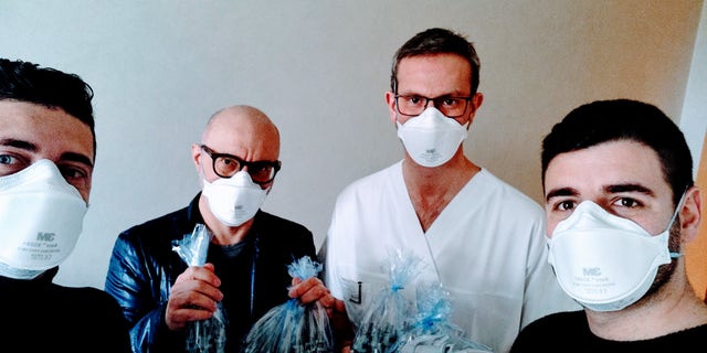 Fracassi and Romaioli delivering 3D-printed valves to the hospital in Chiari.