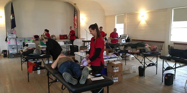 Donors give blood in Boothsbay, Maine at the American Red Cross donation drive