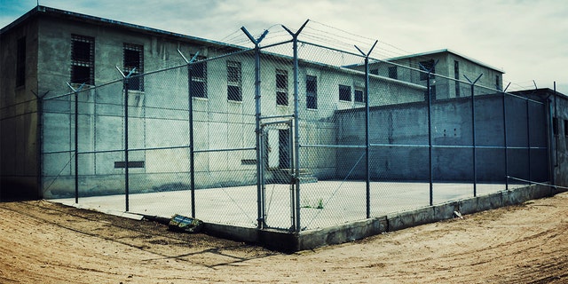 Old maximum security prison yard within a prison yard.