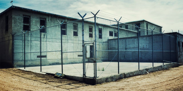 Old maximum security prison yard within a prison yard.