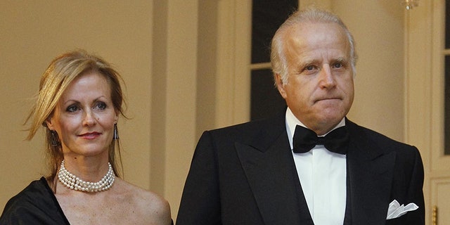 James and Sara Biden arrive at the White House to attend the State Dinner for South Korea, Thursday, Oct. 13, 2011, in Washington. 