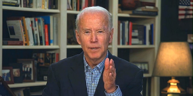 In this image from video provided by the Biden for President campaign, Democratic presidential candidate former Vice President Joe Biden speaks during a virtual press briefing Wednesday, March 25, 2020. (Biden for President via AP)