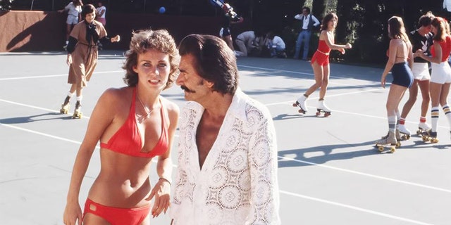 Candace Collins Jordan with LeRoy Neiman at the Playboy Mansion. 