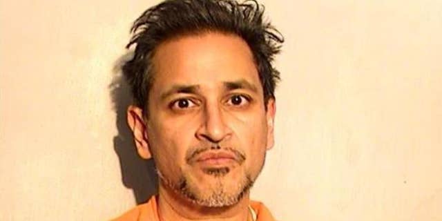 Dr. Manish Gupta, 49, is charged with illegally dispensing controlled substances, aggravated sexual abuse and sex trafficking. (Lucas County Corrections Center)