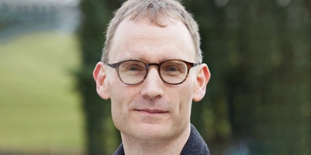 Neil Ferguson, a professor at Imperial College London’s MRC Center for Global Infectious Disease Analysis, made the admission after being in the room with Boris Johnson during a press conference Monday.