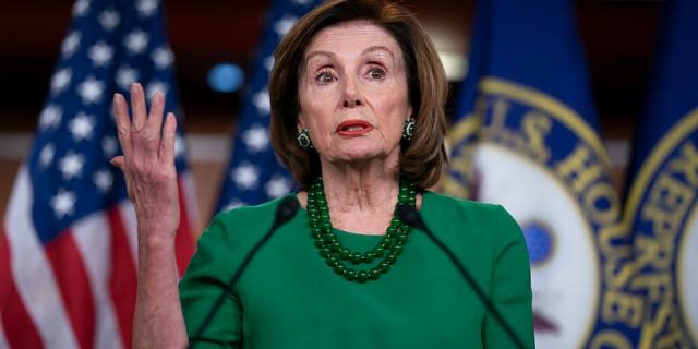 Speaker of the House Nancy Pelosi, D-Calif., updates reporters as lawmakers continue work on a coronavirus aid package, on Capitol Hill in Washington, Thursday, March 12, 2020. (AP Photo/J. Scott Applewhite)