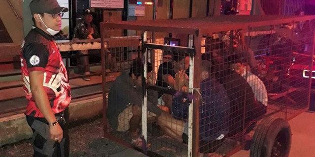 An official in Santa Cruz, the Philippines, is facing several charges after five curfew violators -- including two minors --- were put in a dog cage.