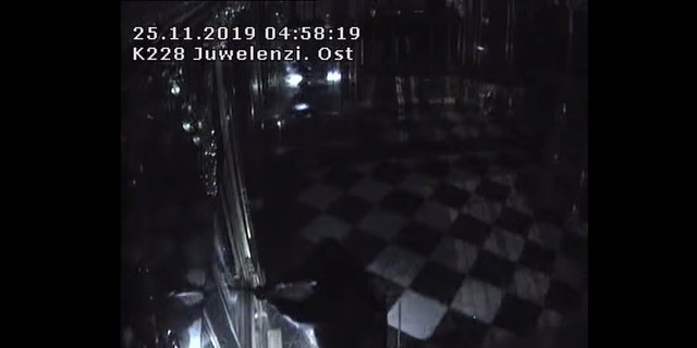 Thieves with torches and tools break into one of the display cabinets in Green Vault museum in Dresden, Germany, November 25, 2019 in this still image taken from a security video. Saxony Police Department/Handout via REUTERS 