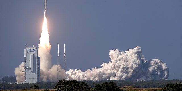 A United Launch Alliance Atlas V rocket lifts off from launch complex 41 at the Cape Canaveral Air Force Station with a payload of a high-frequency satellite Thursday, March 26, 2020, in Cape Canaveral, Fla. Built by Lockheed Martin, this U.S. military spacecraft will provide highly secure communications.