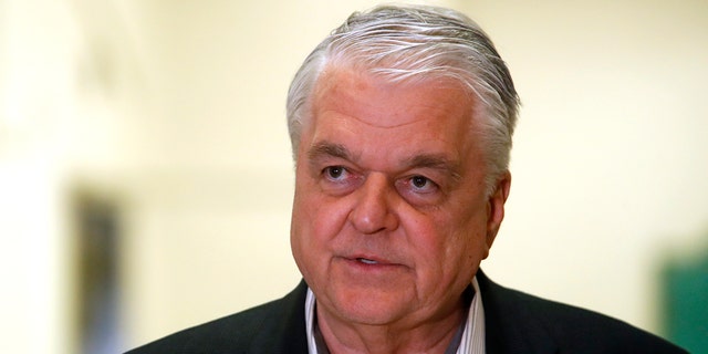 In this Tuesday, March 17, 2020 file photo Nevada Gov. Steve Sisolak speaks during a news conference at the Sawyer State Building in Las Vegas. Sisolak's pandemic-related restrictions on religious gatherings resulted in a lawsuit that went all the way to the Supreme Court. (Steve Marcus/Las Vegas Sun via AP, File)
