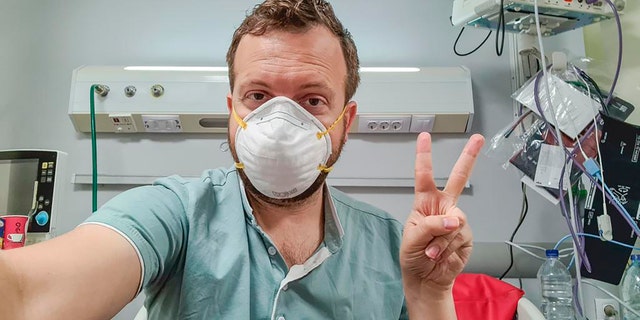 In this photo provided by Matt Swider, posted on Twitter on March 9, 2020, American tourist Matt Swider, takes a selfie while in quarantine in the north coast city of Marsa Matrouh, Egypt.