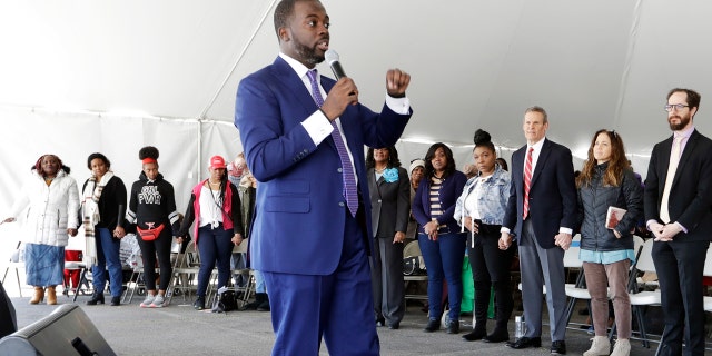 Pastor Jacques Boyd speaks to worshippers during a service in a tent at Mount Bethel Missionary Baptist Church, Sunday, March 8, 2020, in Nashville, Tenn. The congregation held their Sunday service in a tent in the parking lot near the church facilities, which were heavily damaged by a tornado March 3. (AP Photo/Mark Humphrey)
