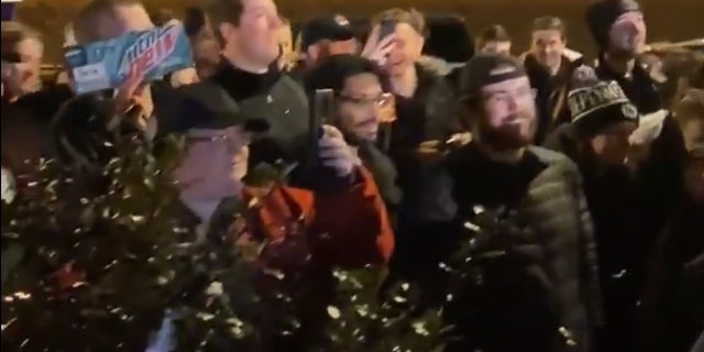 The crowd sang along to a somber version of the Penn State school song during Sunday night's vigil.