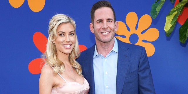 Tarek El Moussa (R) and Heather Rae Young (L) attend the premiere of HGTV's "A Very Brady Renovation" at The Garland Hotel on September 05, 2019, in North Hollywood, Calif. (Photo by Rachel Luna/Getty Images)