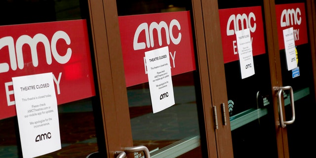 A movie theatre is closed Wednesday, March 18, 2020, in Phoenix. (AP Photo/Matt York)
