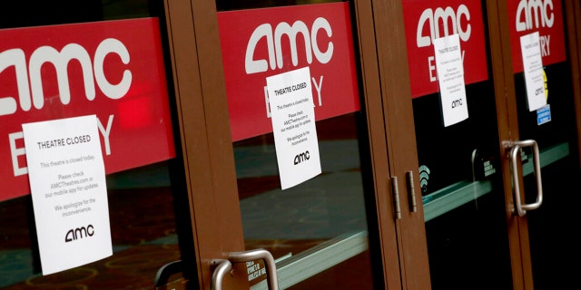 A movie theatre is closed Wednesday, March 18, 2020, in Phoenix. (AP Photo/Matt York)