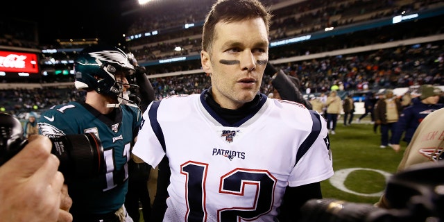 New England Patriots' Tom Brady walks the field after an NFL football game against the Philadelphia Eagles, Sunday, Nov. 17, 2019, in Philadelphia. New England won 17-10. (AP Photo/Michael Perez)