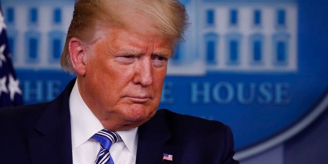 President Donald Trump listens during a briefing about the coronavirus in the James Brady Briefing Room, Monday, March 23, 2020, in Washington. (AP Photo/Alex Brandon)