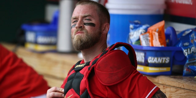 As Major League Baseball and the players' union consider various ways to try to schedule things once the coronavirus pandemic subsides, Reds catcher Tucker Barnhart raised a concern that is surely shared by others around the sport: Could trying to cram in games, and maybe extend the season into late November or December, lead to injuries? (AP Photo/Ross D. Franklin File)