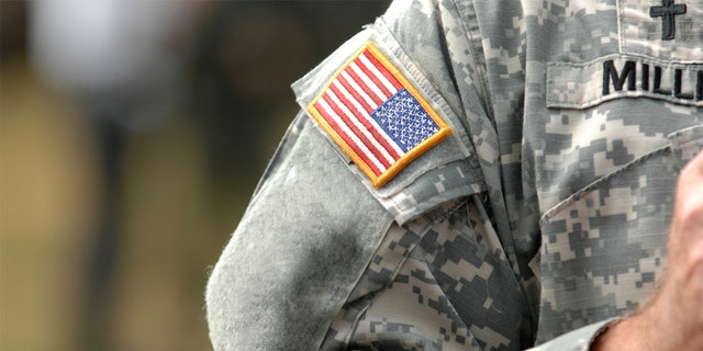 The American flag attached to the American military uniform.