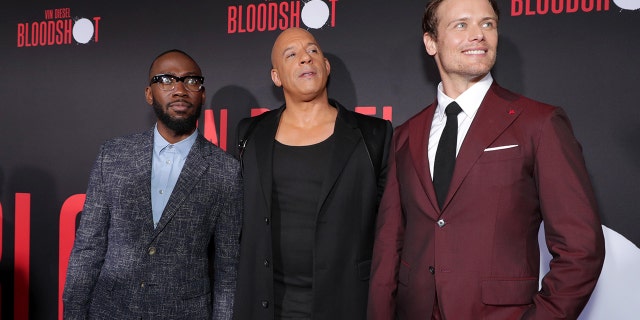 Actors Lamorne Morris, left, Vin Diesel and Sam Heughan, right, at the World Premiere of Columbia Pictures' 'Bloodshot' on March 10, 2020, at The Village Regency in Los Angeles, Calif.