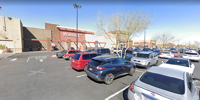 A man was taken into custody after he walked into a Las Vegas Walmart on Sunday wearing a hazmat suit and sprayed numerous people with an unknown liquid amid coronavirus fears, police said.