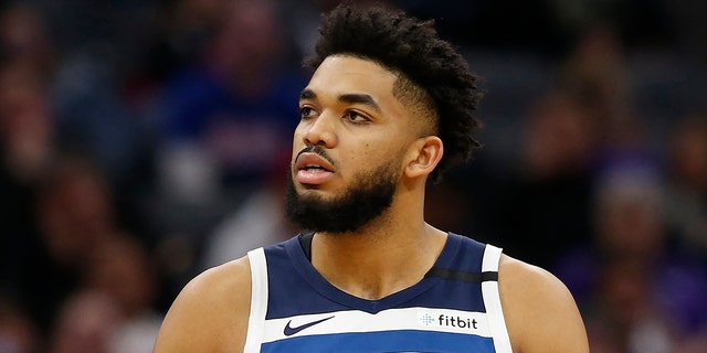 FILE - In this Feb. 3, 2020, file photo, Minnesota Timberwolves center Karl-Anthony Towns is shown during the second half of an NBA basketball game against the Sacramento Kings in Sacramento, Calif. 
